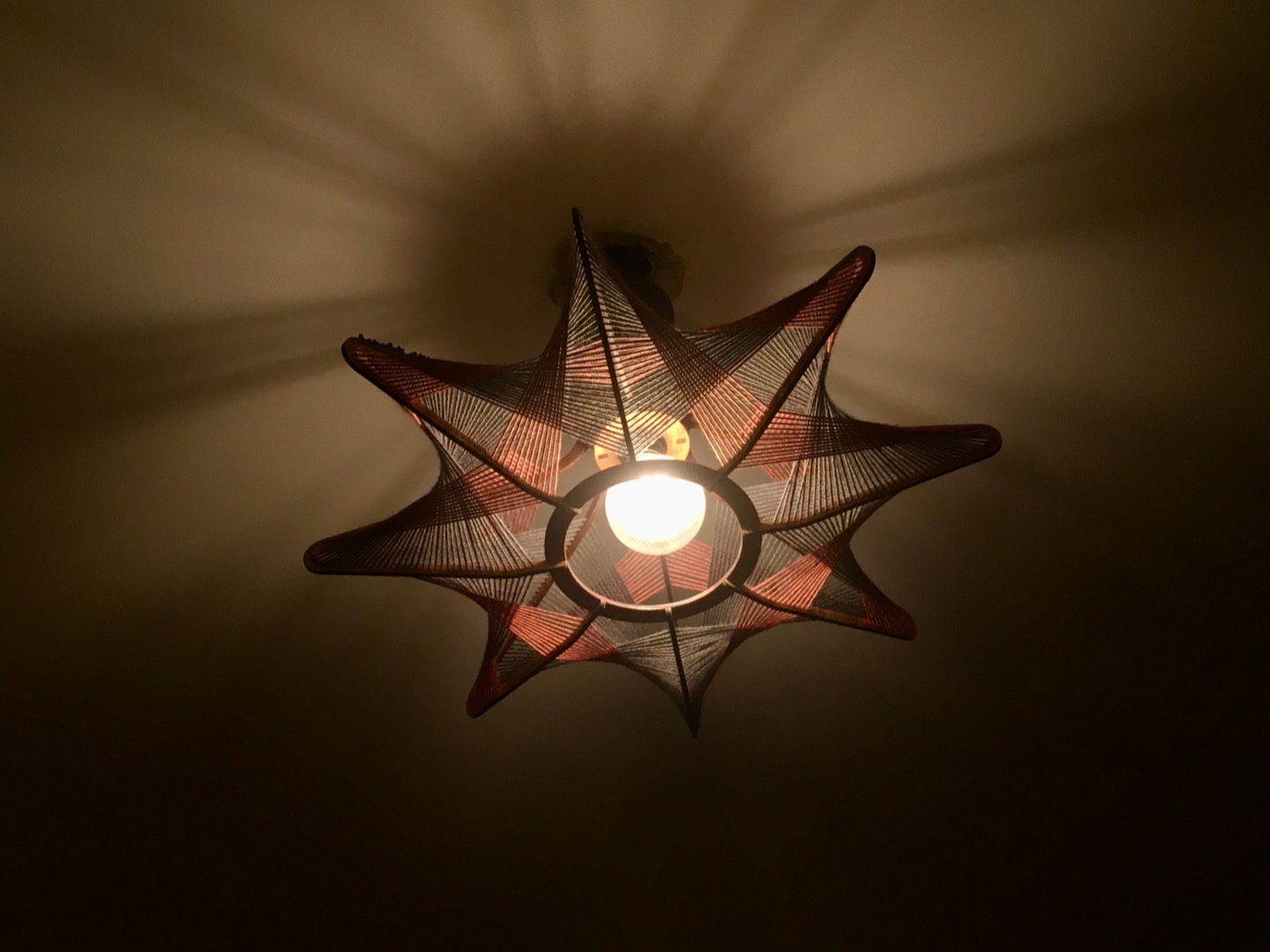 string art lamp illuminated